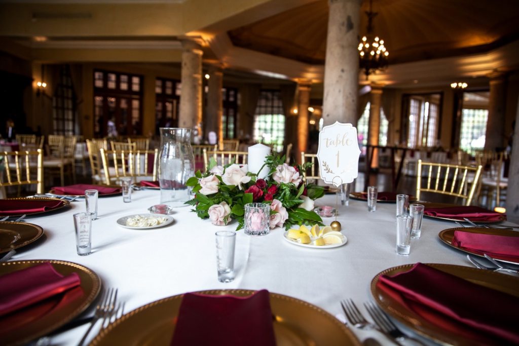 A tabletop with a gorgeous centerpiece at The Dominion Country Club.