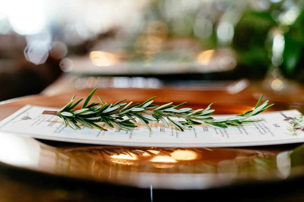 Absolutely Delicious knows it's the details that make the event. Here is a sprig on top of a menu.