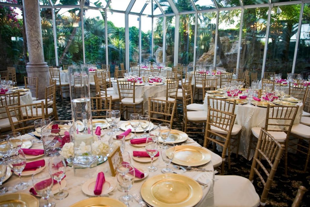 Absolutely Delicious' Sky Room with elegant tables and Gold Wood Chiavari Chairs.