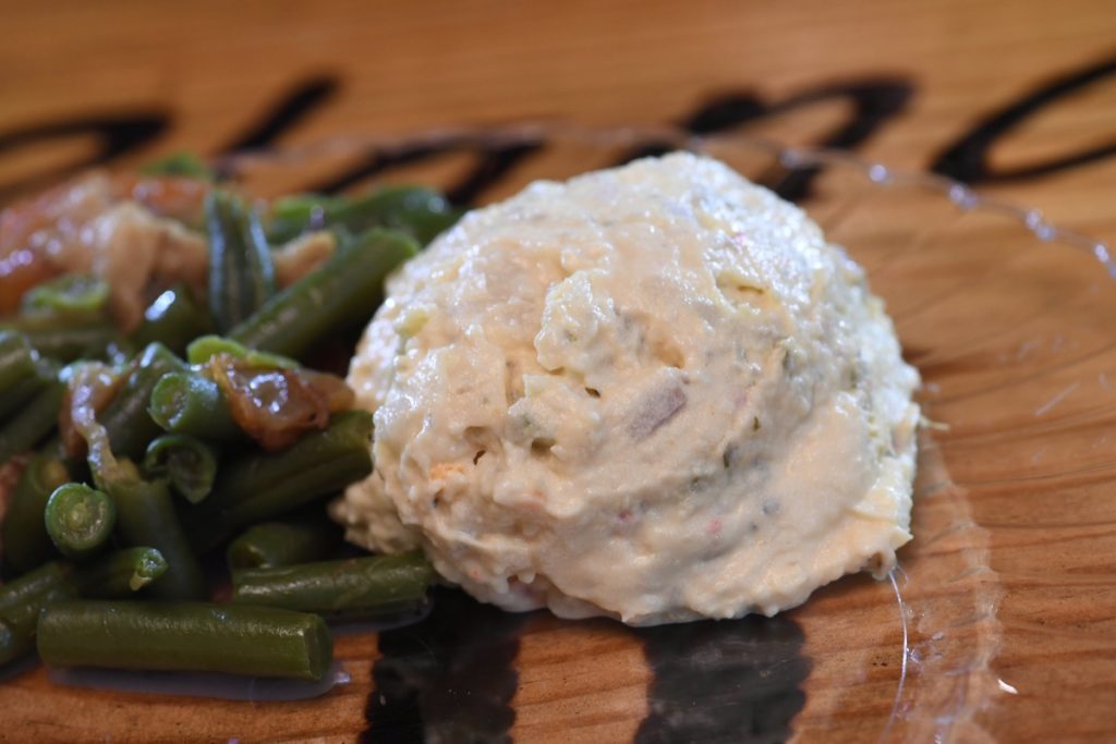 Close-Up picture of Blanco BBQ dollops a smidgen of potato salad with green beans