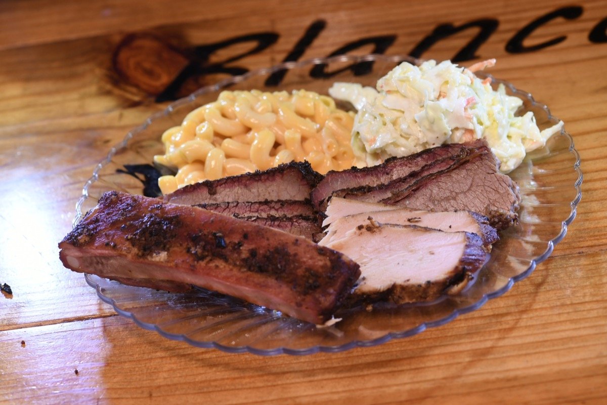Blanco BBQ's standard fare of a beef rib, turkey, and brisket.... with a helping of cole slaw and macaroni-and-cheese.