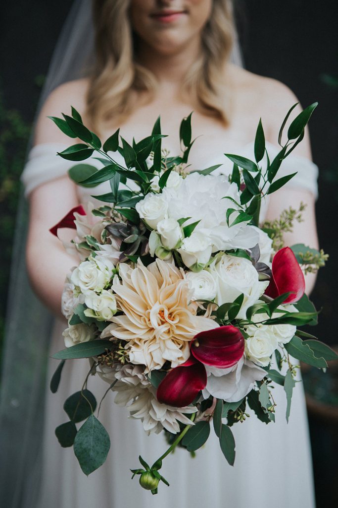 A Freesia Designs wedding bouquet sets the mood for the wedding!