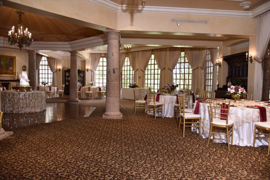 In this area, is the cake n the far left with the tables all alongside of the roundish room, near the windows, of The Dominion.