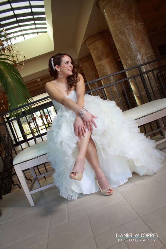 A model bride awaits her prince ;o) Sh sits on a comfortable sittee in the lobby of the hotel.