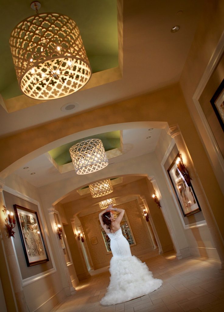 A model bride stretches in the lobby of The Eilan Hotel Resort and Spa.