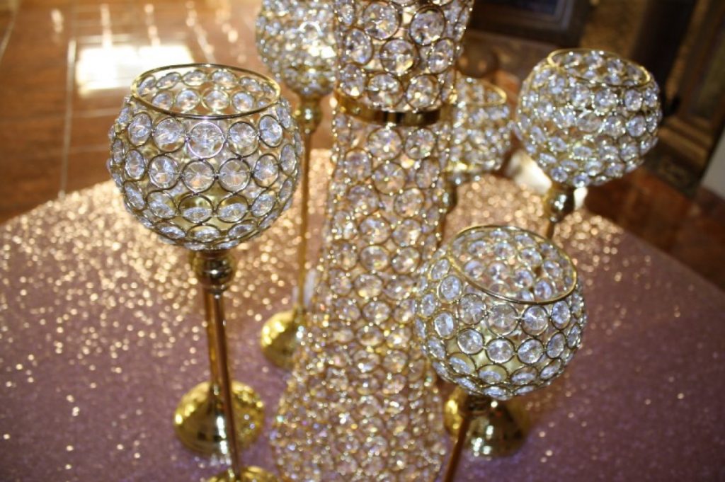 Close-up of golden goblets which are actually The Emporium by Yarlen candleholders!