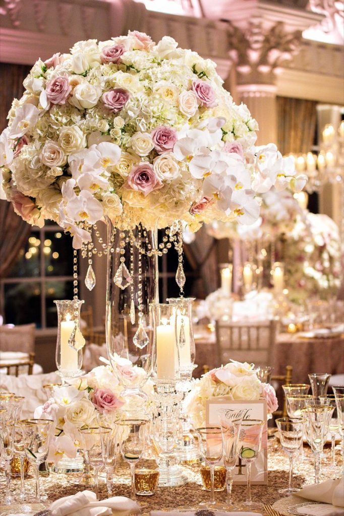 A Freesia Designs centerpiece with jewelry dangling is so elegant.