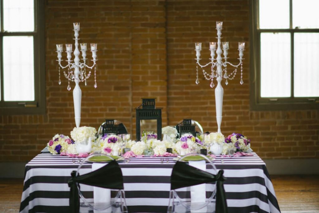A wonderful Freesia Designs designed table and chairs that gives a playful mood to the whole reception!