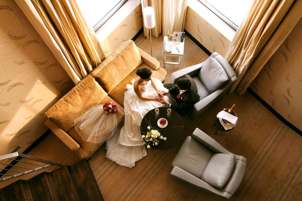 A bride and Groom contemplate their upcoming life as a couple at The Hilton San Antonio Airport.