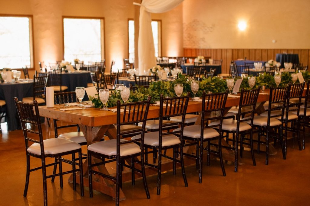 A long table is ready for the wedding party at The Chandelier of Gruene.