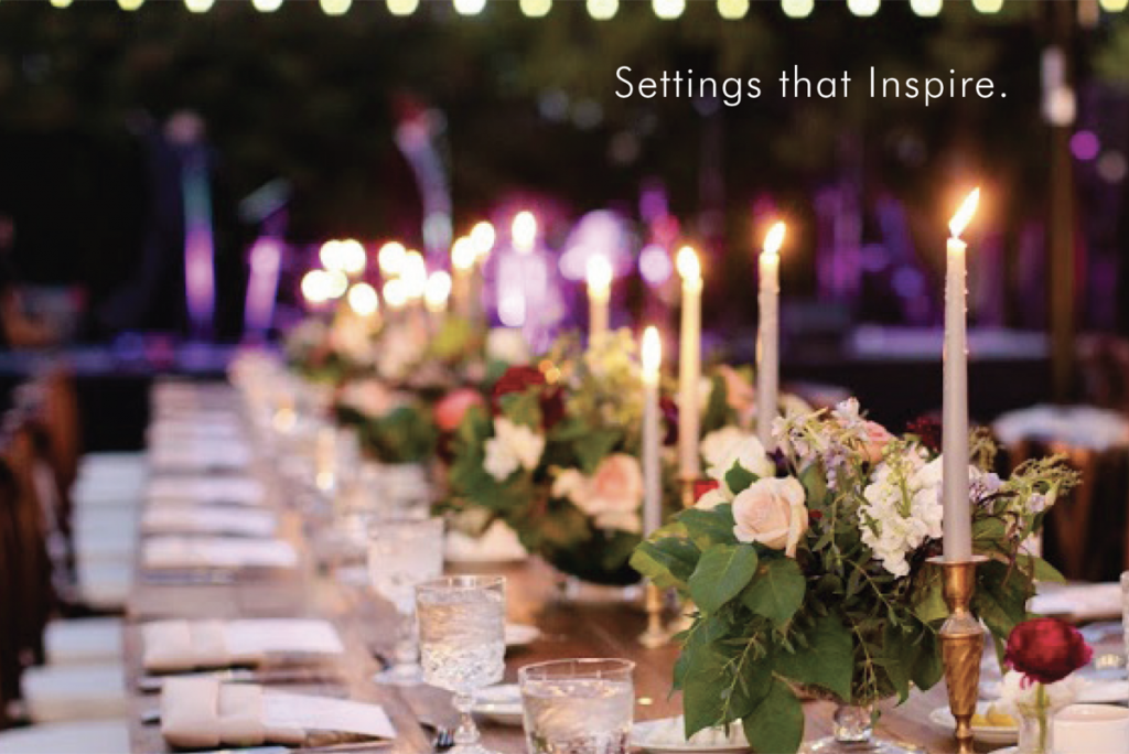 Settings that inspire. A set of florals and candles at the bodal party table.
