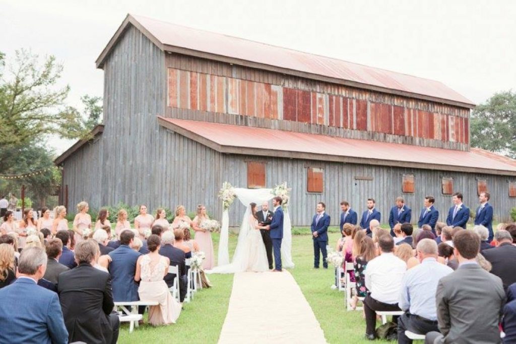 An outdoor ceremony off to the side of Eagle Dance Ranch Barn.