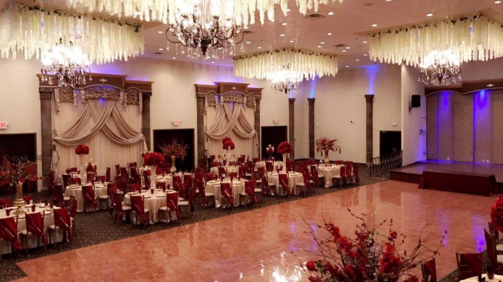 An elegant red and white theme highlights this wedding banquet at the Emporium by Yarlen!
