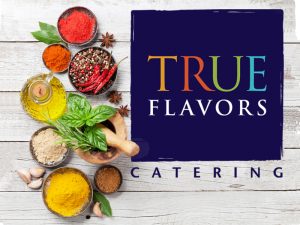 True Flavors logo on a board with spices