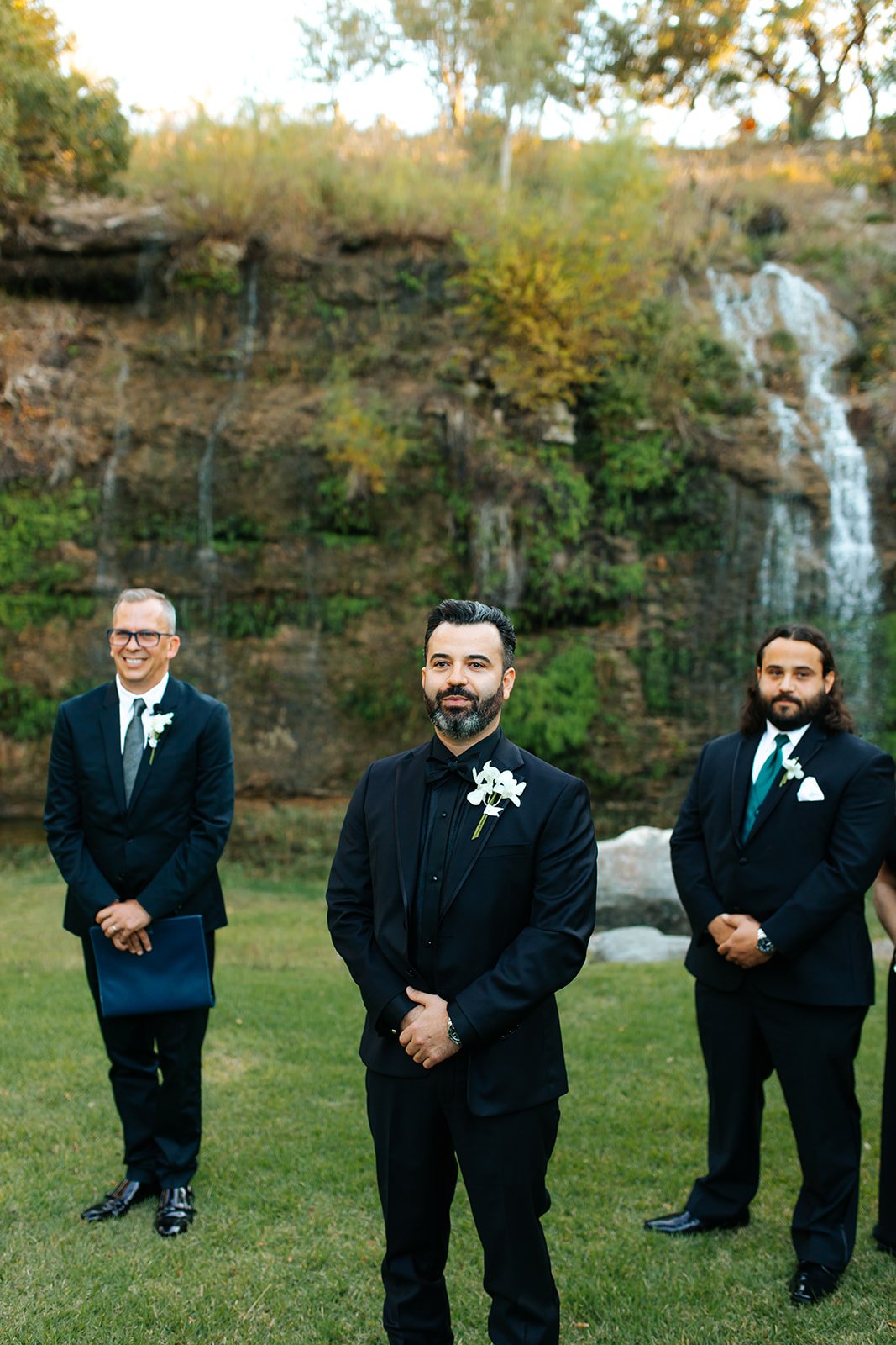 groom and groomsmen waiting for the bride