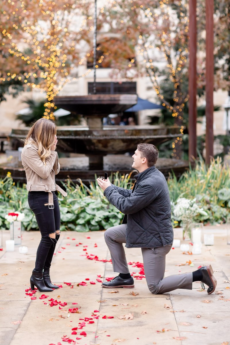 Caitlyn and johns surprise proposal photos by Hannah Charis