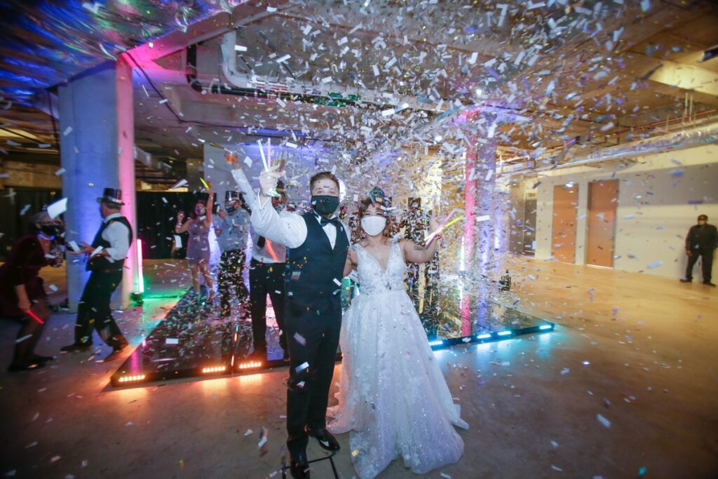 San Antonio Weddings couple, Dax and Yumi, at Frost Tower Dos Kiwis